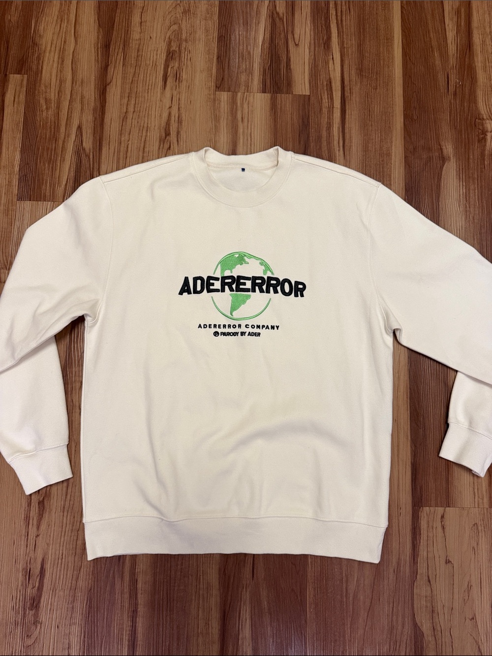 AderError Cream Crewneck Sweatshirt with Green Globe Logo
